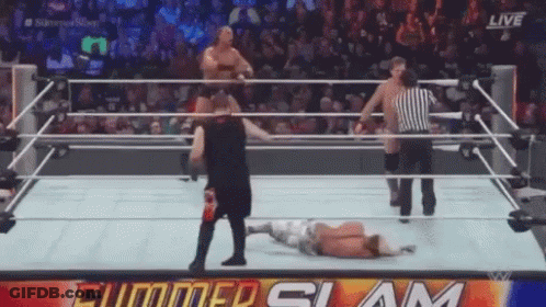 Man Lying In Wrestling Ring Referee Watching GIF