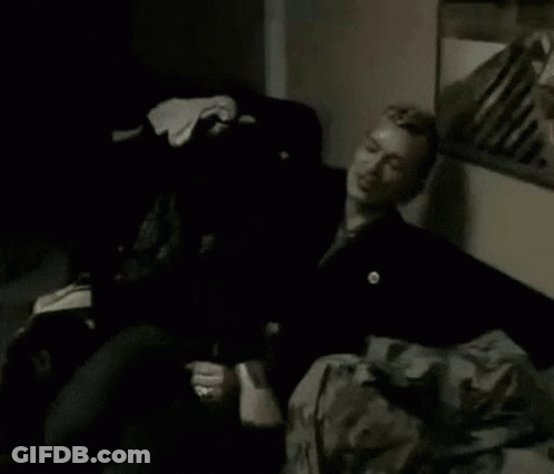 Man Lying On Bed In Dark Room GIF