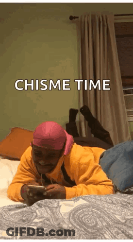 Man Lying On Bed Looking At Phone Chisme Time GIF