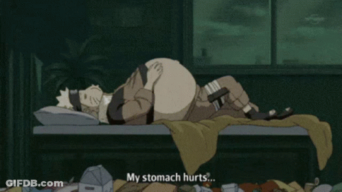Man Lying On Bed Saying My Stomach Hurts GIF