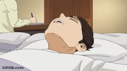 Man Lying On Bed With Pen GIF