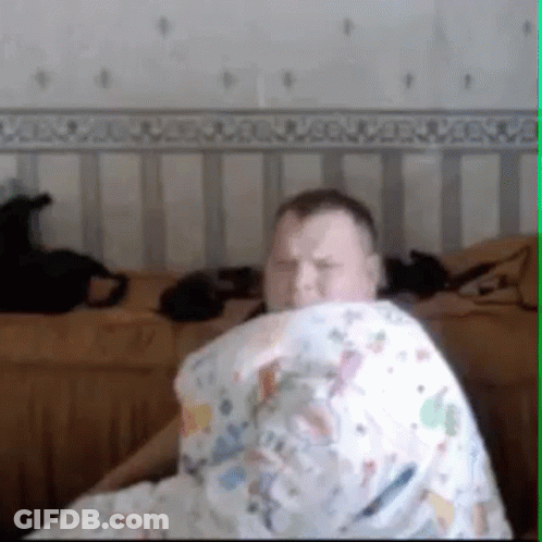 Man Lying On Bed With Pillow On Head GIF