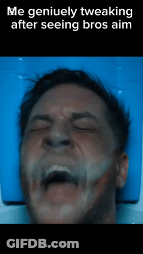 Man Lying On Blue Blanket With Eyes Closed GIF