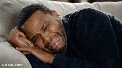 Man Lying On Couch Crying GIF