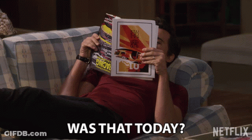 Man Lying On Couch Reading Magazine Was That Today GIF