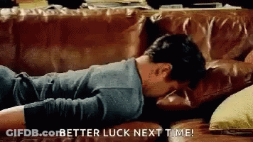 Man Lying On Couch Saying Better Luck Next Time GIF