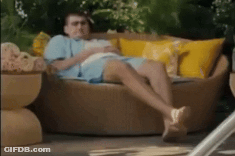 Man Lying On Couch With Book GIF