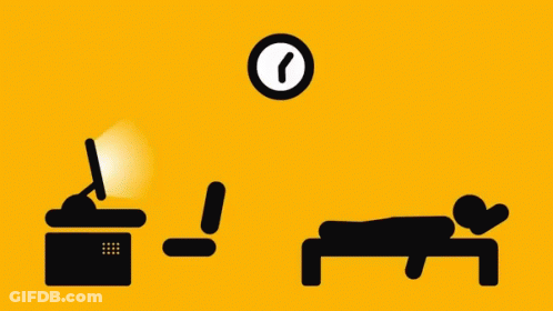 Man Lying On Desk With Clock Behind GIF