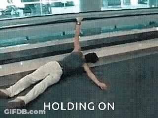 Man Lying On Floor Holding Beer GIF