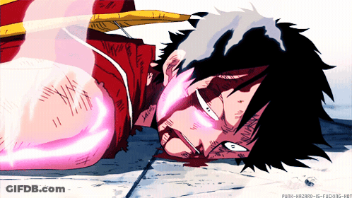 Man Lying On Ground With Pink Light From Eye GIF