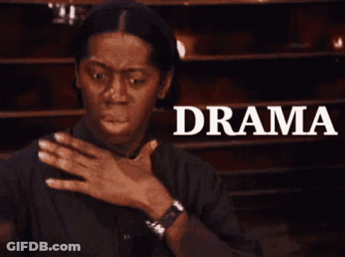 Man Making Face At Drama Sign GIF