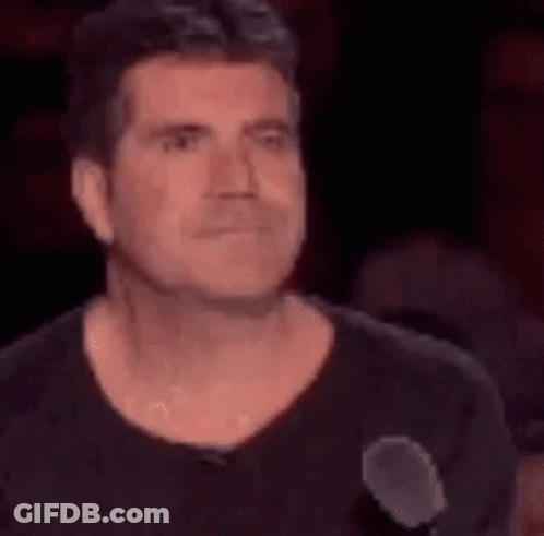 Man Making Face At Microphone GIF