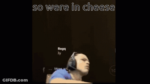 Man Making Face Saying So Were In Cheese GIF