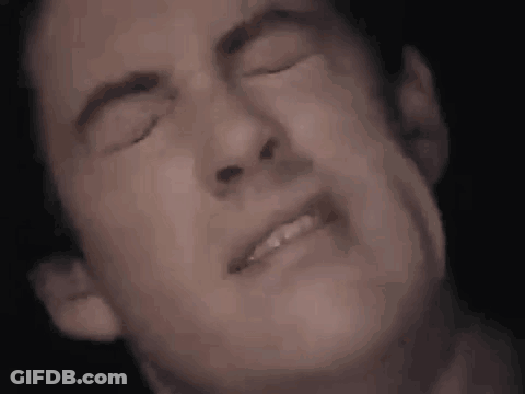 Man Making Face With Eyes Closed GIF