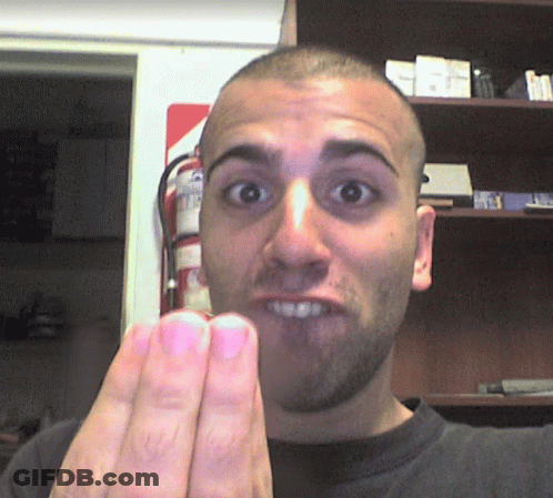 Man Making Funny Face At Extintor Fire Extinguisher GIF