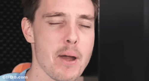 Man Making Funny Face Eyes Closed GIF