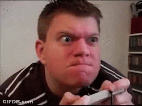 Man Making Funny Face Holding Cell Phone GIF