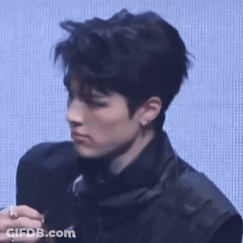 Man Making Funny Face Holding Microphone GIF