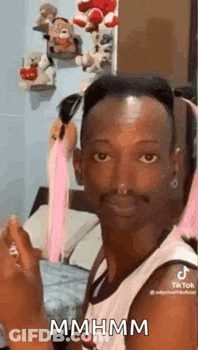 Man Making Funny Face In Bedroom GIF