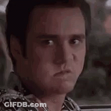Man Making Funny Face In Car GIF