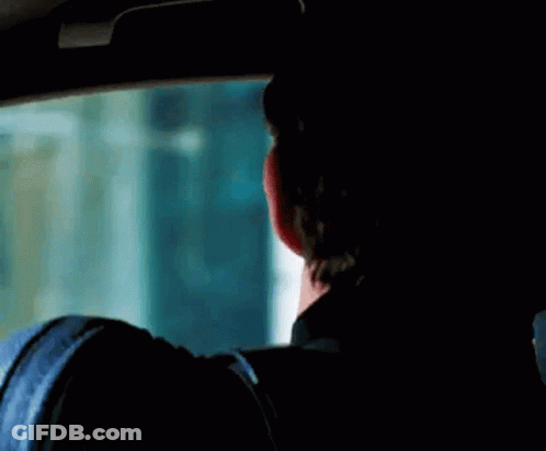 Man Making Funny Face In Car GIF