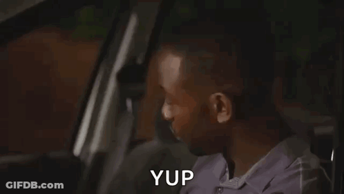 Man Making Funny Face In Car GIF