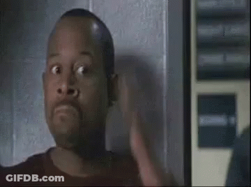 Man Making Funny Face In Dark Room GIF
