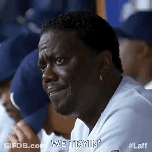 Man Making Funny Face In Dugout With Team GIF
