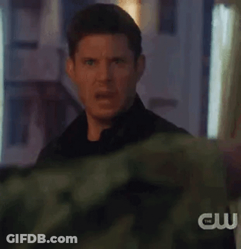 Man Making Funny Face In Front Of Building GIF