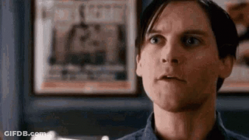 Man Making Funny Face In Front Of Framed Picture GIF