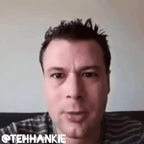 Man Making Funny Face On Couch GIF