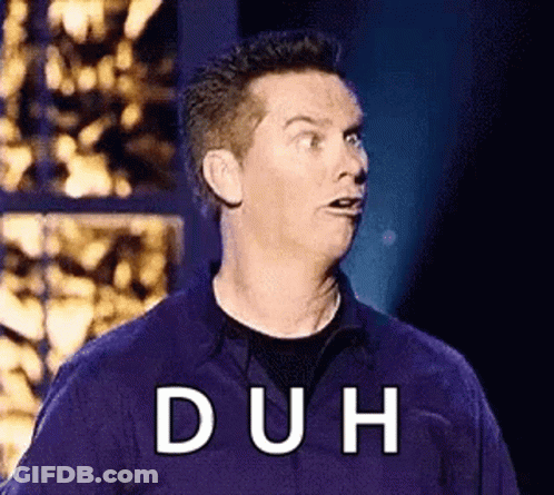 Man Making Funny Face On Stage Saying Duh GIF