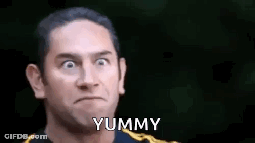 Man Making Funny Face Saying Yummy GIF