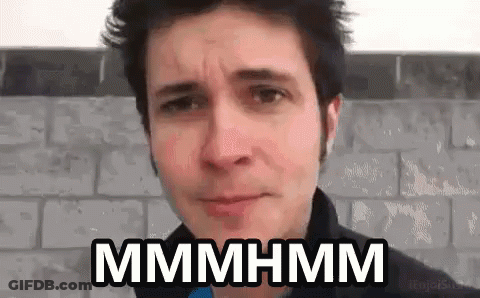 Man Making Funny Face Says Mmmmhmm GIF