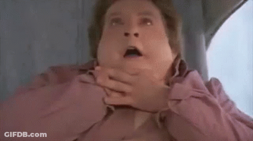Man Making Funny Face Sitting In Chair GIF