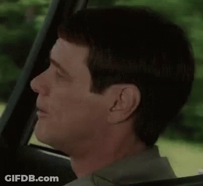 Man Making Funny Face While Driving GIF