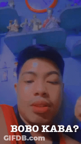 Man Making Funny Face With Bobo Kaba GIF