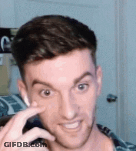 Man Making Funny Face With Finger On Nose GIF