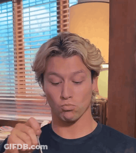 Man Making Funny Face With Fork GIF
