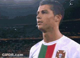 Man Making Funny Face With Hands At Door GIF