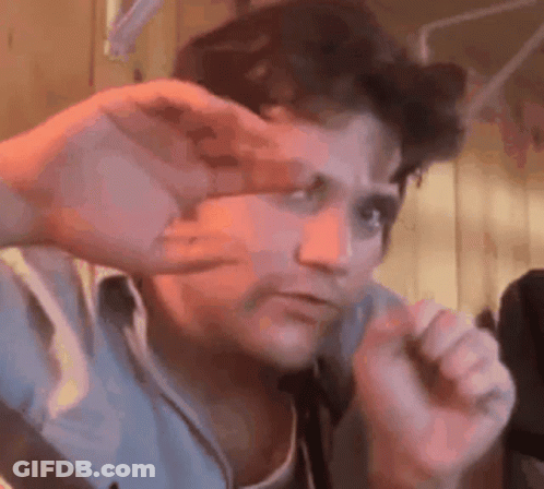 Man Making Funny Face With Hands GIF