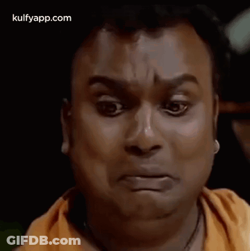 Man Making Funny Face With Mouth Open And Eyes Closed GIF