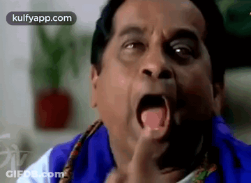 Man Making Funny Face With Mouth Wide Open GIF
