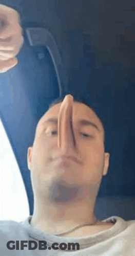 Man Making Funny Face With Nose In Air GIF