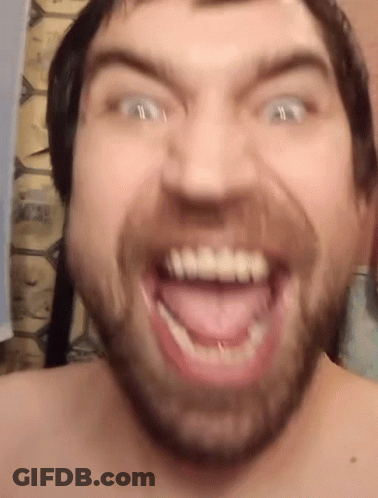 Man Making Funny Face With Teeth GIF