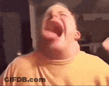 Man Making Funny Face With Tongue Out GIF