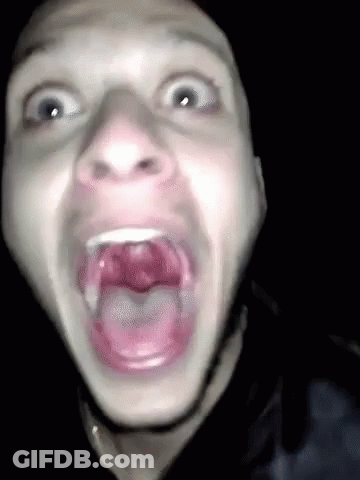 Man Making Funny Face With Wide Open Mouth GIF