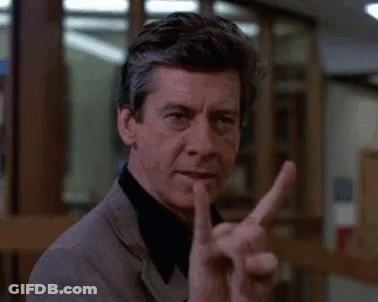 Man Making Peace Sign GIF