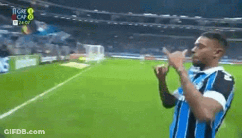 Man Making Peace Sign On Soccer Field GIF