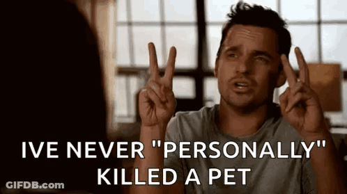 Man Making Peace Sign Talking To Another Man GIF